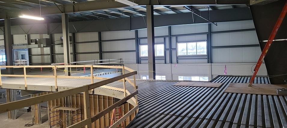 Photo 9: The running track encircling the upper level of the fieldhouse.