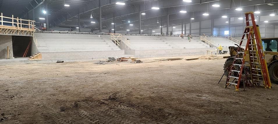 Photo 13: Looking west from the corner of the arena surface.