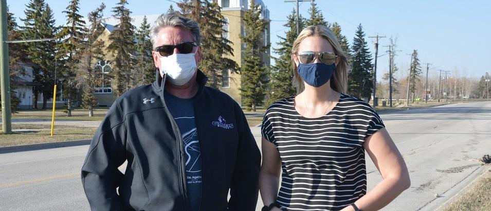 Ste. Agathe Community Development Inc. president Claude Lemoine and director Danielle Robert are seen on the streets of Ste. Agathe. The group hopes to get a Citizens on Patrol Program up and running in the community.