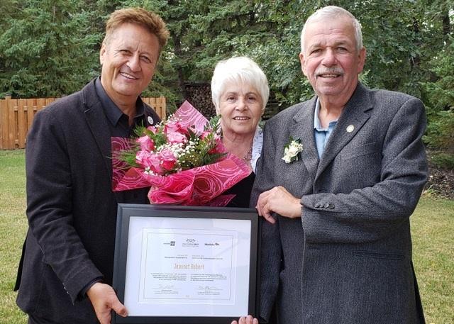 MLA Ron Schuler with Jeannot Robert and his wife Yvonne.