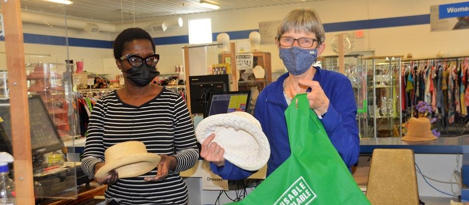 Niverville MCC Thrift Shop volunteer Olasunkanmi Dickson-Isu and day manager Debbie Sandland are hard at work on a Thursday morning.
