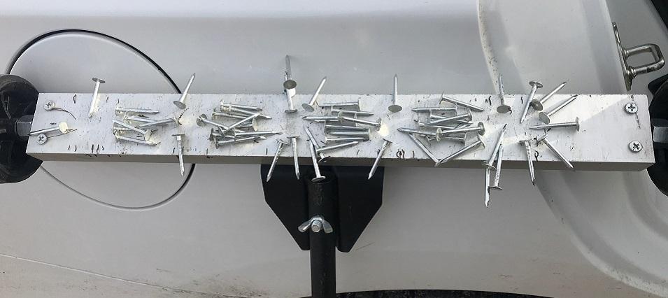 Nails collected from the surface of Highway 200 last year.