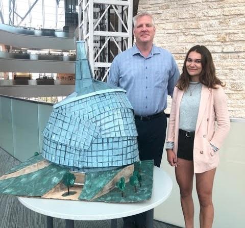 Human Right Museum CEO Dr. John Young with Maddie Thompson of Niverville.