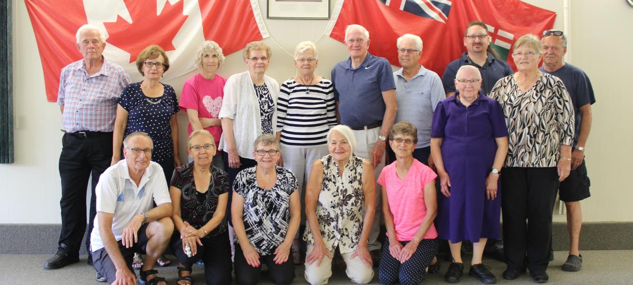 Back row: Fred Bergmann, Susan Bergmann, Debbie Litman, Helen Friesen, Norma Rempel, Walter Rempel, Bernie Falk, Damien Gagne, and Doug Houlbrook. Front row: Doug Adams, Irene Adams, Susan Funk, Orpha Schryvers, Lillian Falk, Elma Doerksen (standing), and Helen Toews (standing).