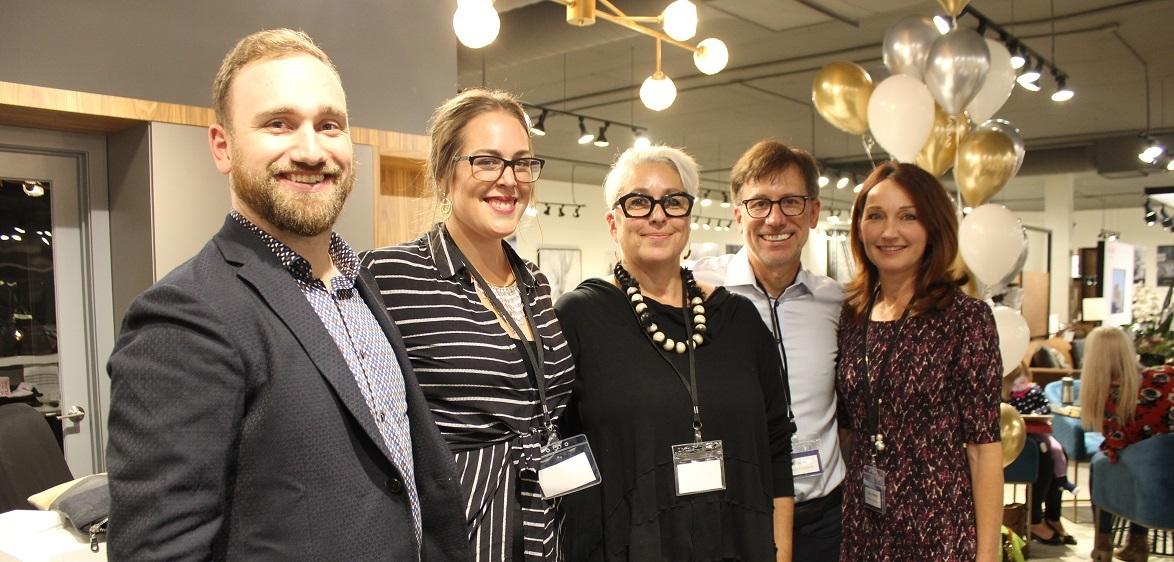 Dylan and Amanda Wiens, designer Carol Vellier, and Al and Ruby Wiens in the renovated Wiens Furniture showroom.