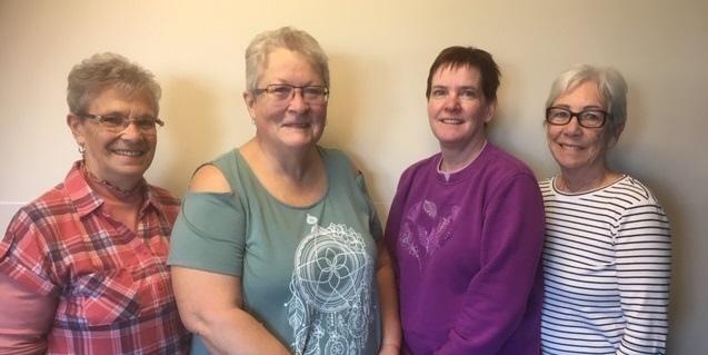 The Vintage Club executive team: Bev Baggley (chair), Sharon Burns (co-chair), Dena Fox (secretary), and Helen Mondor (treasurer).