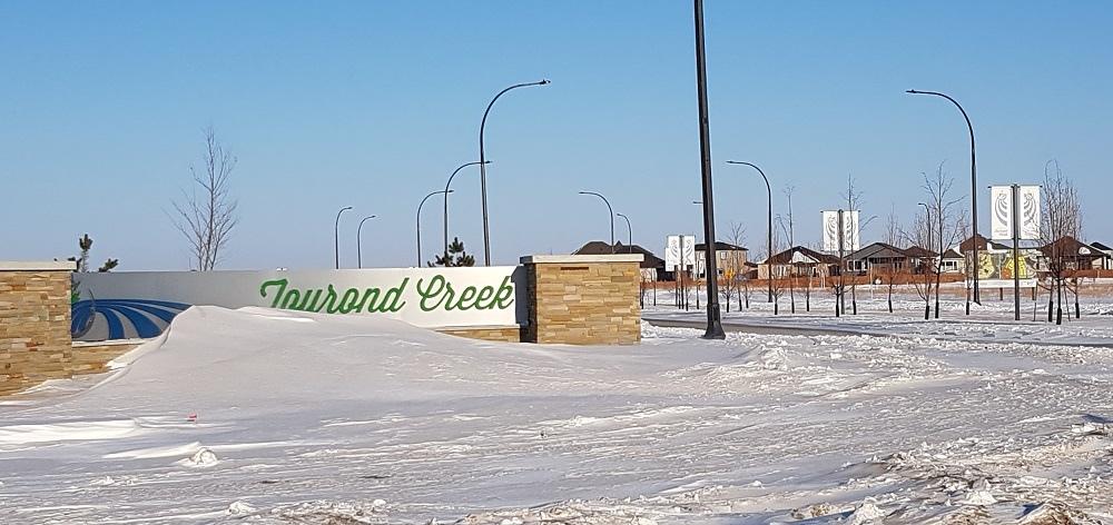 The entrance to the Tourond Creek development in St. Adolphe.