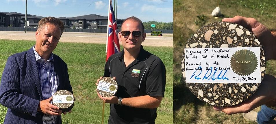 MLA Ron Schuler and Ritchot Mayor Chris Ewen, displaying transfer of ownership keepsakes made from the road's asphalt surface.