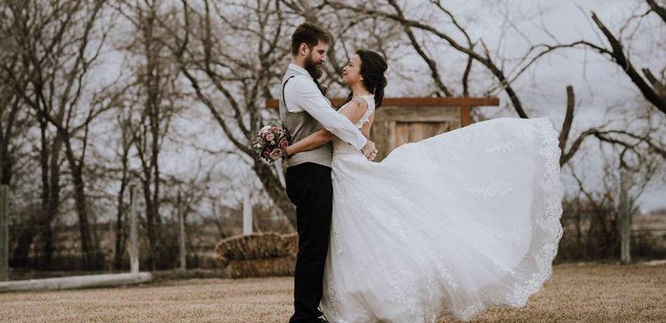 Darryl Wolfe and Becky Mentuck at their smaller-than-intended wedding in April.