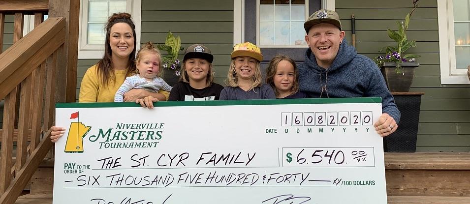 Jordan and Heather St. Cyr, with their four children.