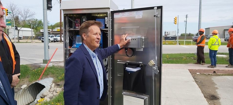 The moment when Ron Schuler flicked the traffic signals into operation for the first time.