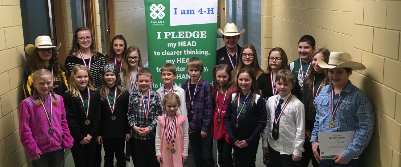 Members of the Sunset Riders 4-H Club gather at the Eastman Zones to deliver speeches.
