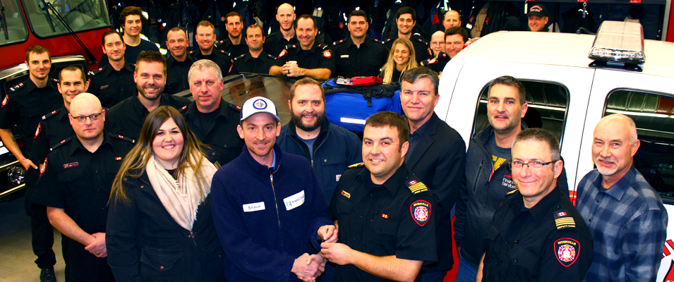 Shaun Macsymic of TransCanada hands over the keys for the new vehicle to Fire Chief Keith Bueckert and the rest of Niverville’s Emergency Services personnel.