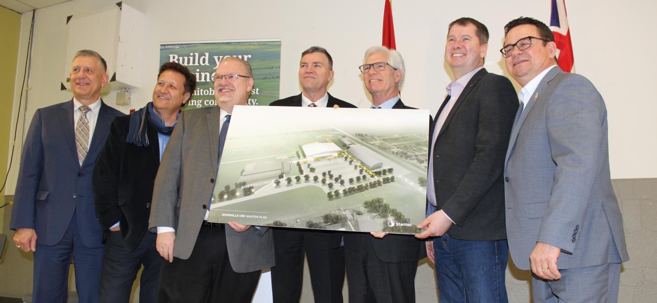 Provencher MP Ted Falk, MLA Ron Schuler, Minister of Education Kelvin Goertzen, Niverville Mayor Myron Dyck, Minister of International Trade Diversification Jim Carr, Morris MLA Shannon Martin, and Minister of Municipal Relations Jeff Wharton.