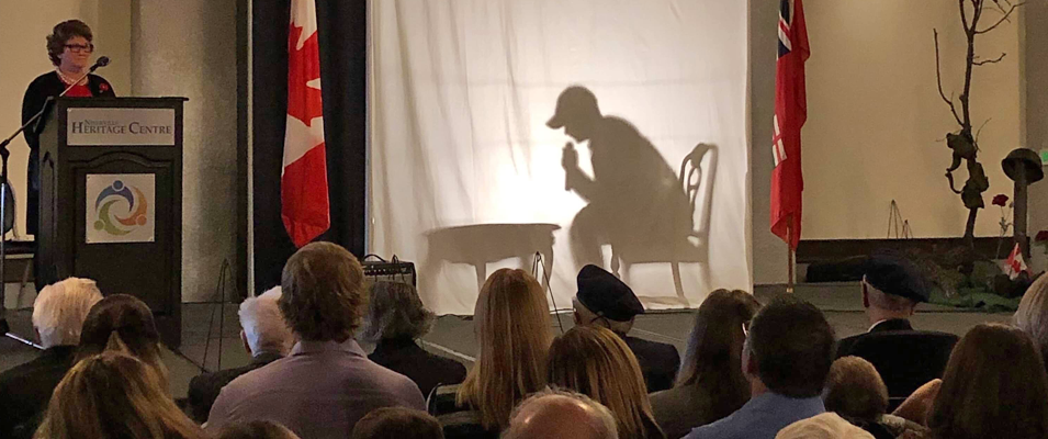 Silhouette vignettes being performed at this year's Remembrance Day ceremony in Niverville.