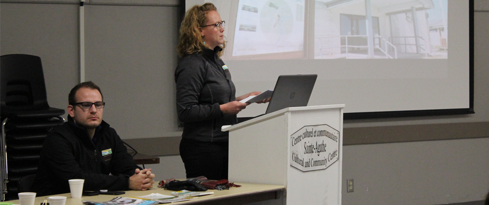 Amber Mamchuk reviews the recreation master plan at a Ste. Agathe open house.
