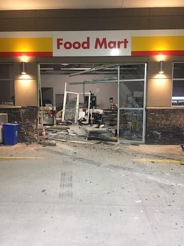 Damage from a truck breaking through the front doors of Niverville Shell.