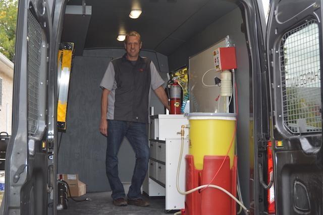 Emile Jolicoeur stands ready in the Freedom Fire mobile unit.