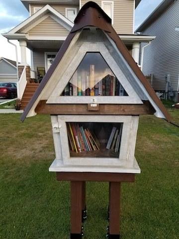 The Little Free Library in Kaite Desrosiers’s yard.