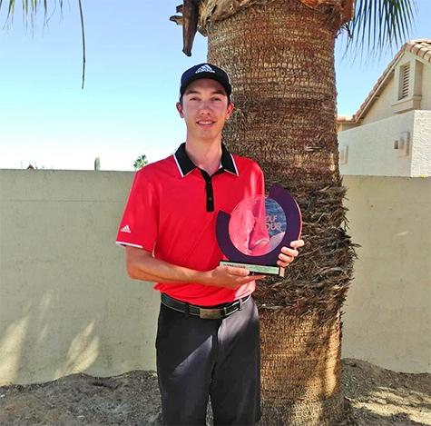 Colwyn Abgrall displays his trophy from the Golf Channel AM Tour event at Ak-Chin Southern Dunes in Arizona.