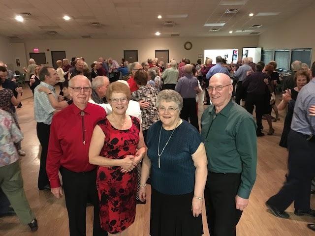 Four of the people involved with the upgrades to Pioneer Hall: Jules Manaigre, Rae Manaigre, Denise Belisle, and Romeo Belisle.