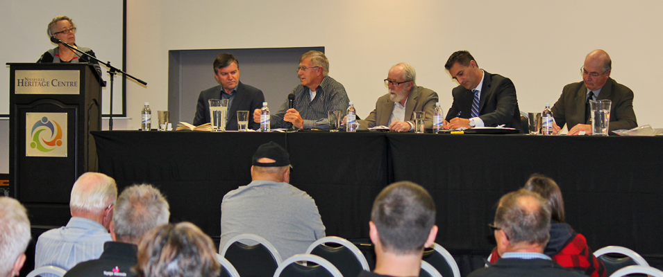 Dawn Harris presides over a town hall discussion with Mayor Myron Dyck and councillors John Funk, Chris Wiebe, Nathan Dueck, and Kevin Stott