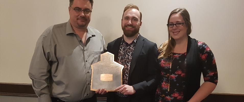 John Magri with Dylan Wiens and Amanda Wiens, accepting the award for Business of the Year.