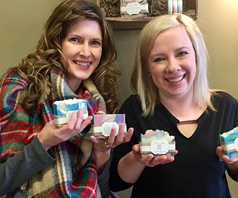 Ricki ten Hove and Amy Buhler show off their wares