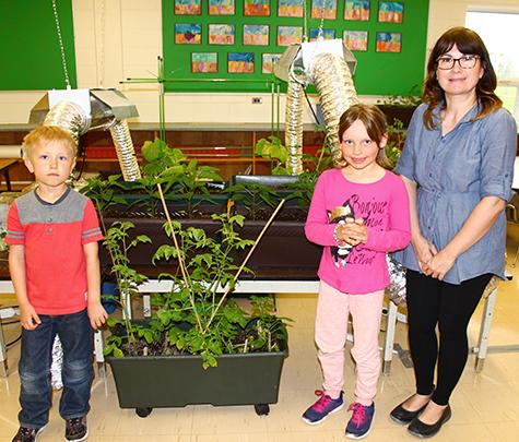 Lynn Gobeil with students Ben and Graci