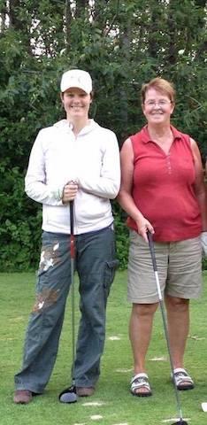 Carol Dyck and daughter Kelly Friesen celebrate her hole-in-one