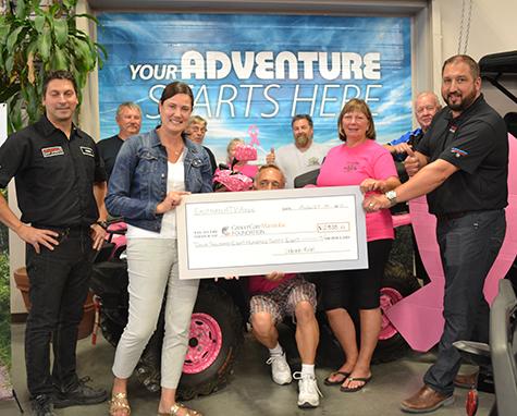 The Eastman ATV Association presents a cheque to Cancer Care Manitoba