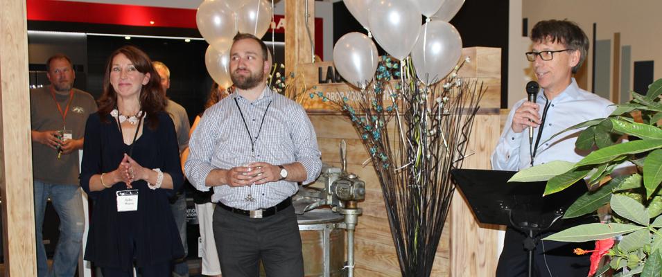 Ruby, Dylan, and Al Wiens at the sneak preview of the new appliance showroom