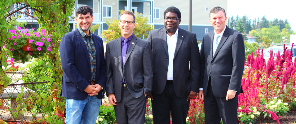 Felipe Campuzano, Gordon Daman, Yves Limbo, and Niverville Mayor Myron Dyck