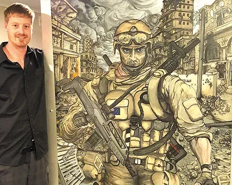 Joe Ashwell poses with his work