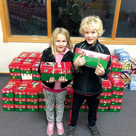 Willa and Max Dowse with their shoebox donations