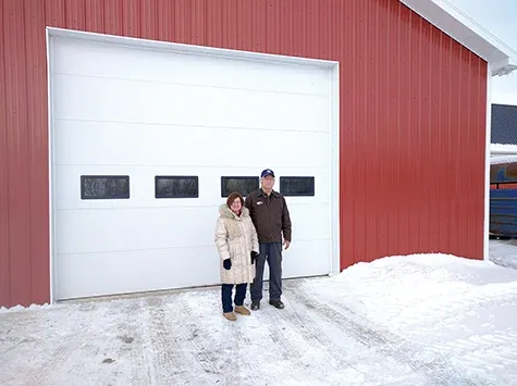 Carol and Ernie Lemoine outside their shop