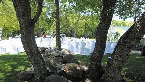 Setting up for an outdoor ceremony at Evergreen Village