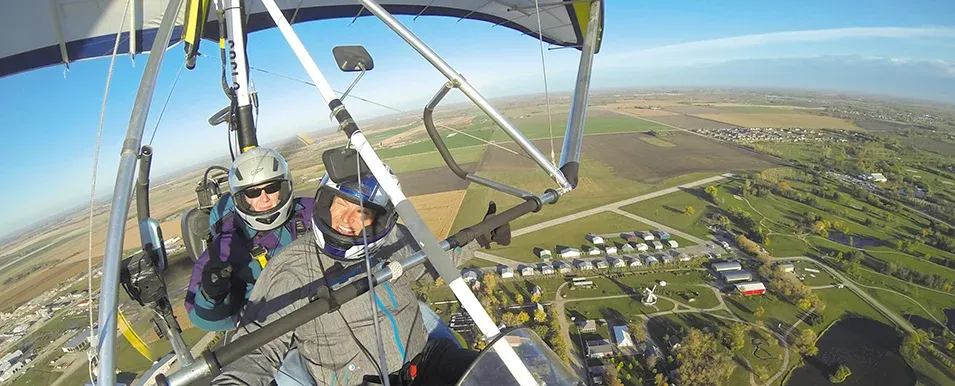 Barry Morwick takes a passenger for a tour over Steinbach